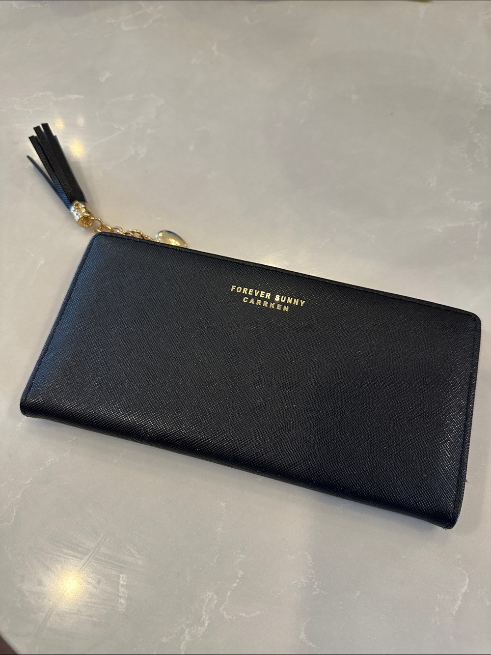 Forever Sunny Carrken Black Zip Wallet with mauve interior and tassel pull